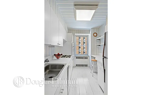 Sold by Douglas Elliman | media 12