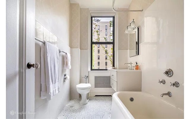 Sold by Douglas Elliman | media 18