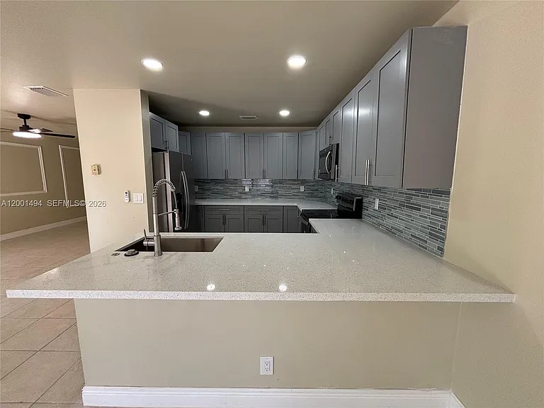 5450 NW 94th Ter — Photo 12