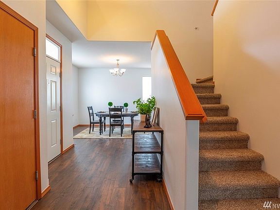 New laminate floors welcome you at the door.  New carpet for the full upstairs.