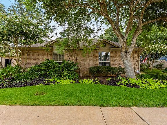 This home has wonderful curb appeal with beautifully maintained yard and gardens with mature landscaping. The zoned sprinkler system cover the entire front, and back, yards.