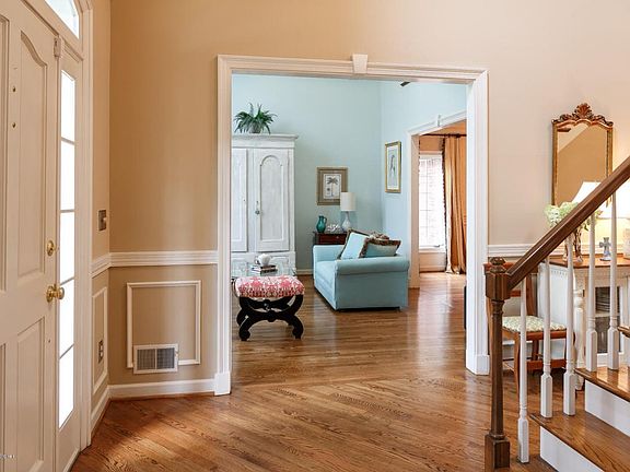 Beautiful entryway with wide staircase