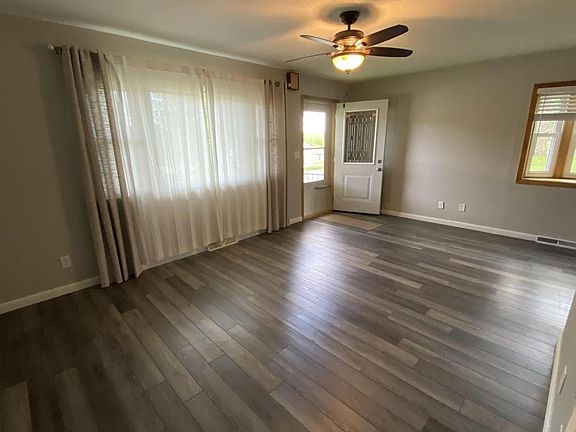 A spacious living room greets you upon entry. 