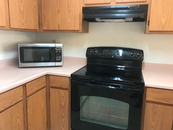 Kitchen View - Microwave and Cooking Stove