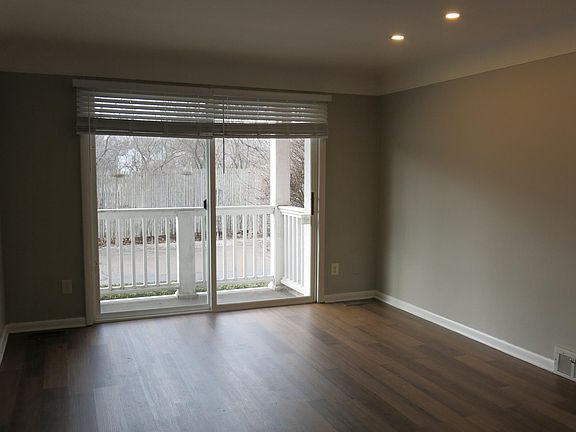 Living area from front door leading to patio