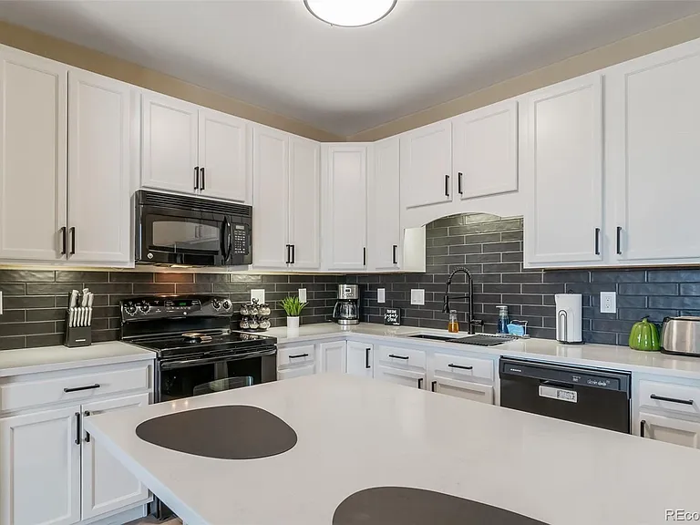 7292 S Blackhawk St #203 — Photo 13