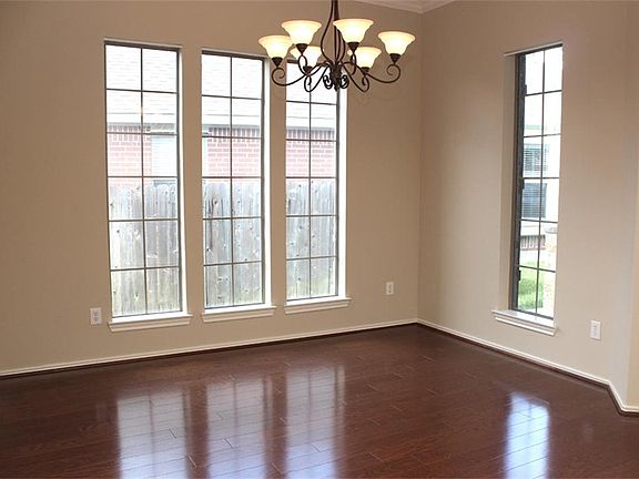 Formal dining room has hardwood floors