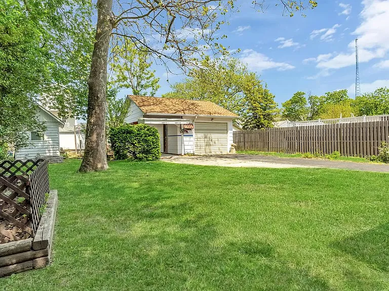 Backyard - driveway and garage