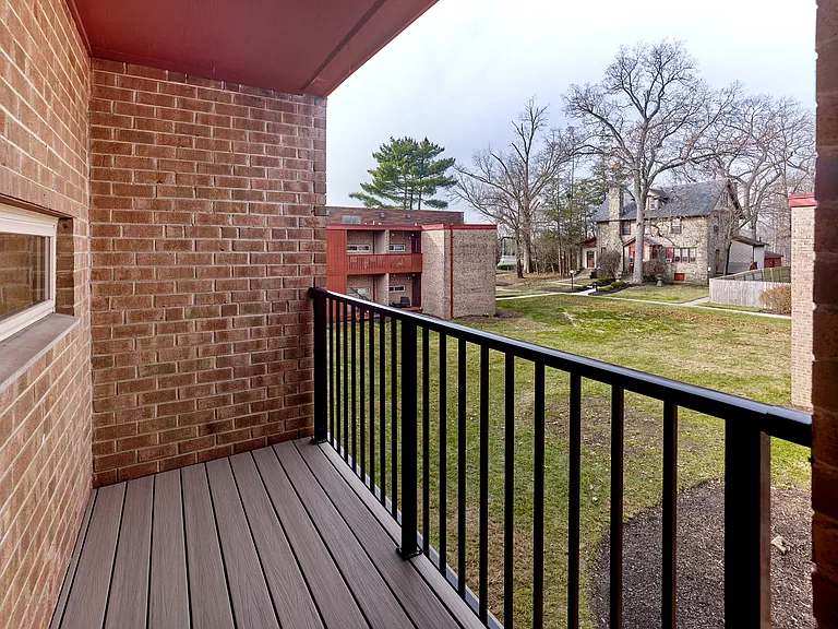 Private balcony with peaceful courtyard views in this 2 Bed, 1.5 Bath, 989 sq. ft. home.
