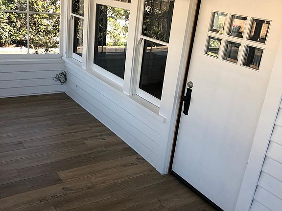 Enclosed front patio to the living room.  