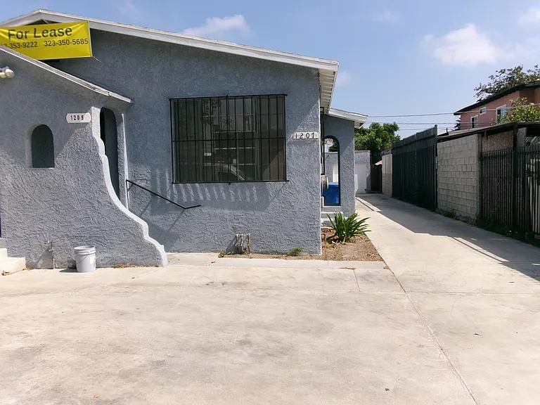 1209 W 60th Pl — Photo 1
