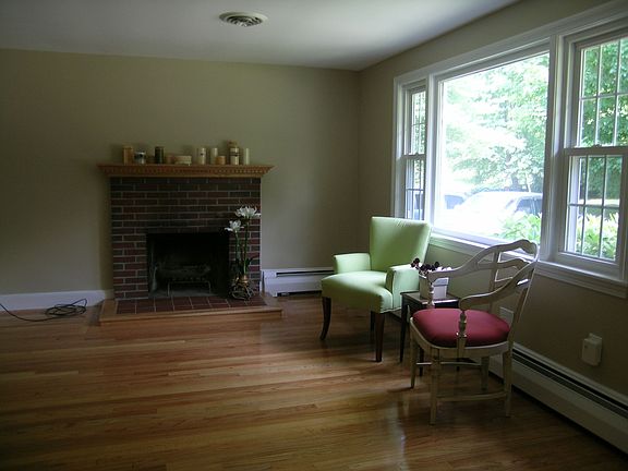 family room-refinished hardwood, working fireplace