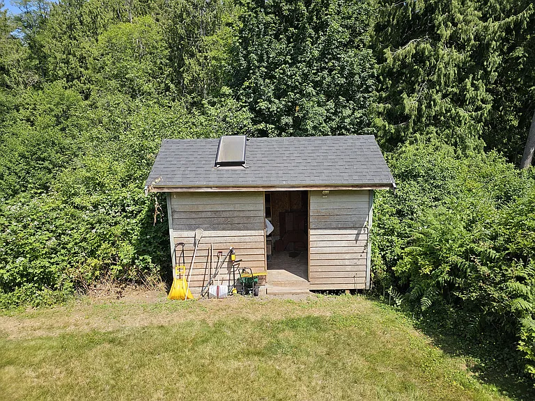 Tool shed located at the back of the home.
