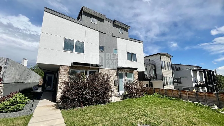 Modern 3-Bedroom Townhouse with Private Rooftop Deck in West Colfax! — Photo 1