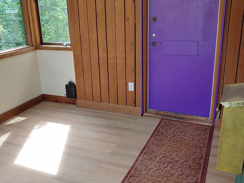 The entry is an unheated green house. A second security door leads into the main unit.