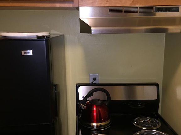 Appliances included...apartment sized fridge, oven & microwave