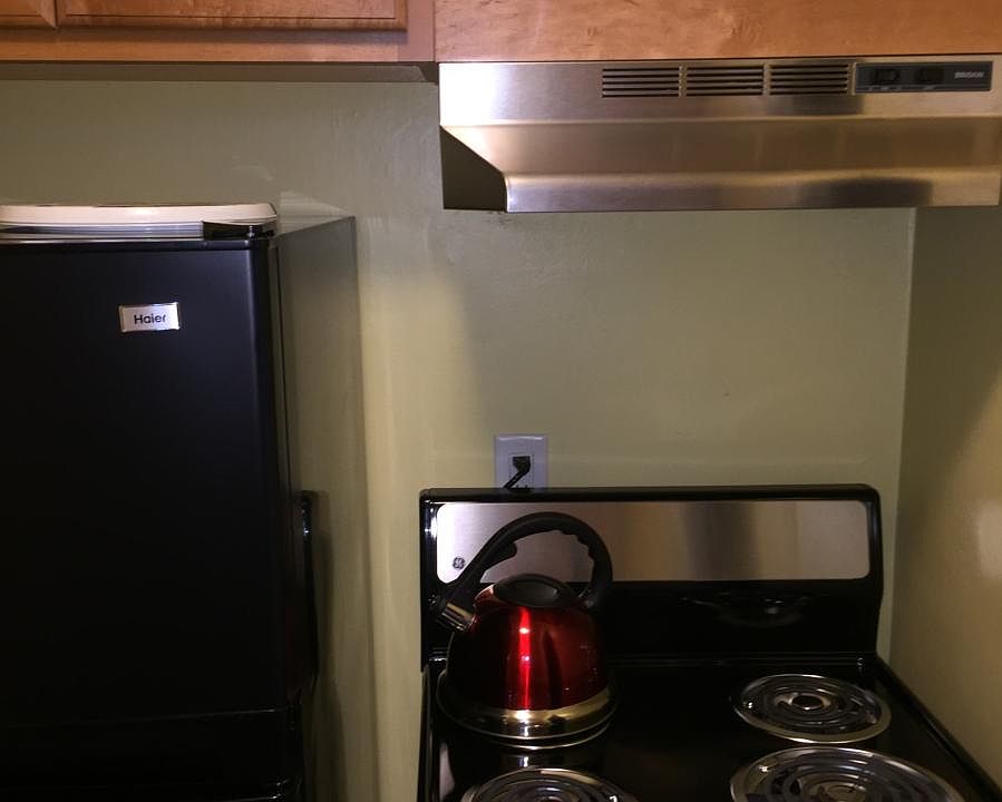 Appliances included...apartment sized fridge, oven & microwave