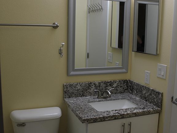 Bathroom entry off the kitchen or bedroom