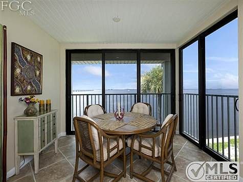 Enclosed lanai with direct bayfront views.