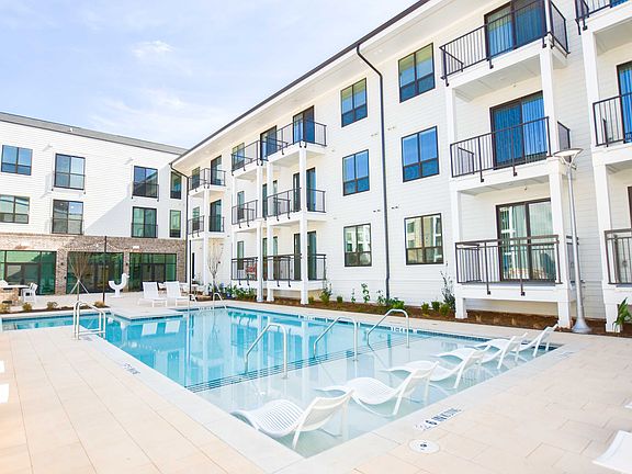 Modern swimming pool with lounge