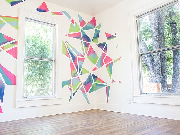 Tall ceilings with oversized windows allow for lots of light