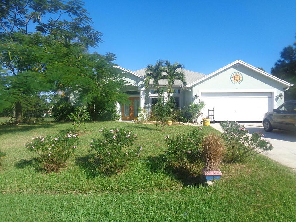 1st image of 6784 NW Abigail Ave