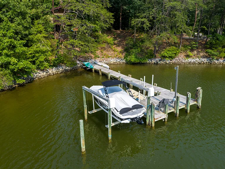 Dock with lift and jet ski dock.