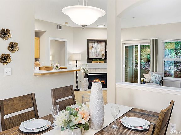 This floorplan offers an excellent combination of open concept and designated spaces thanks to the arched open wall and bar height countertop.