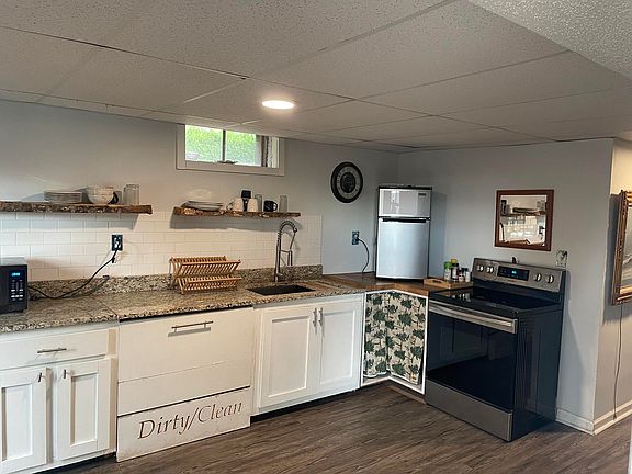 A fairly spacious granite countertop fully equipped