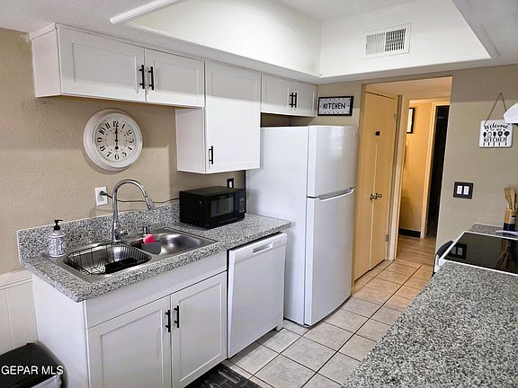 3rd image of 6700 Escondido Dr APT E9