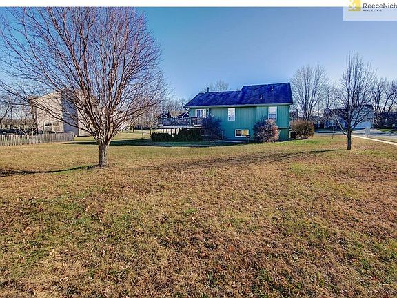 So much room with this lot ! over 17,000 ft ! Deck that wraps around the side with plenty of room for your out door furniture and grill