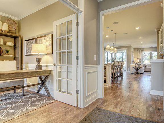 Welcoming Foyer and Flex Room with optional French Doors for a Study. Model representation.