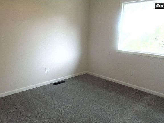 BR with large window to back yard, includes closet