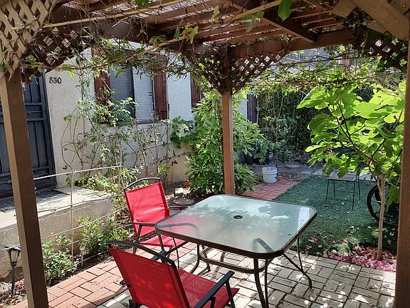 Comfortable covered garden seating area