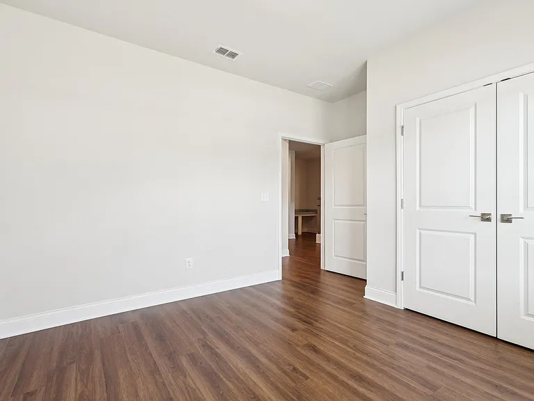 Spacious secondary bedroom with plenty of room to relax.