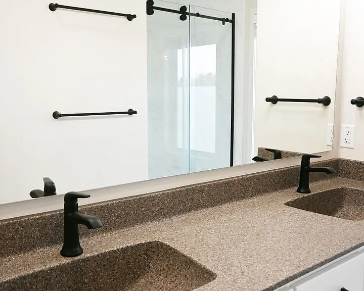 Bright lighting in a bathroom at Lyric Townhomes.