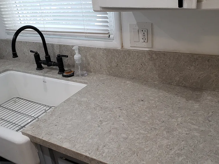 Kitchen sink and window.