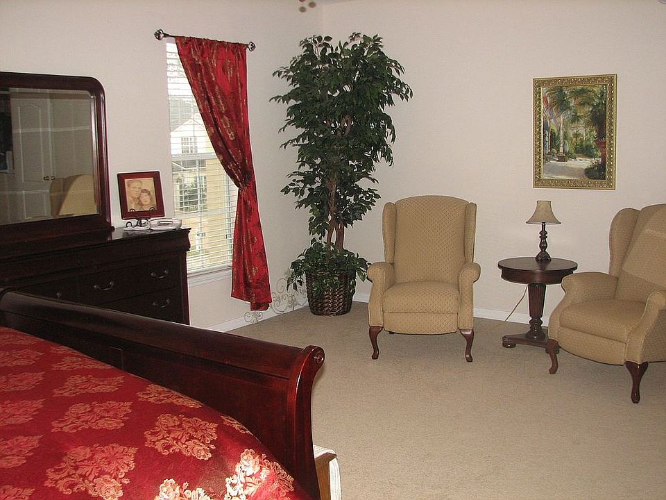Large master bedroom with sitting area