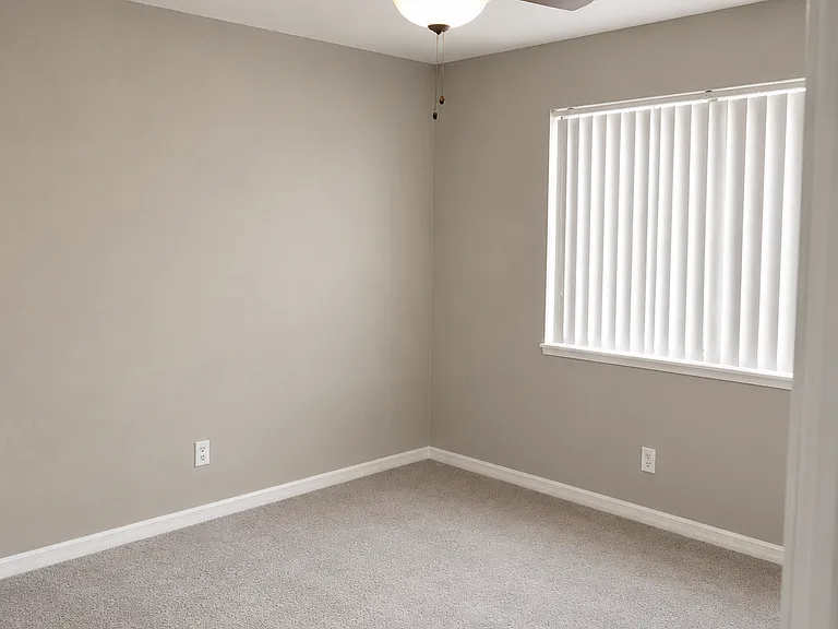 Spacious second bedroom with ample closet space.