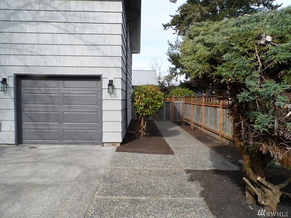 Attached one car garage gives you 3 covered parking spots.