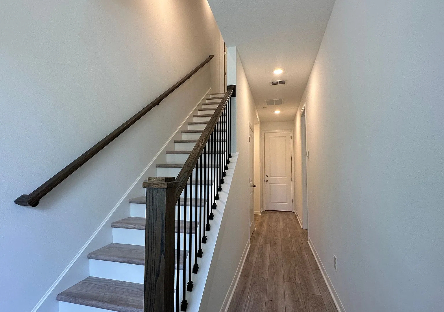 Stunning 3-Story Corner Unit with 3 Private Suites | Internet Included — Photo 3