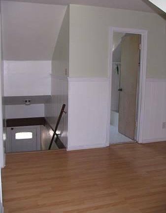 View from the living area - staircase up from the entrance a