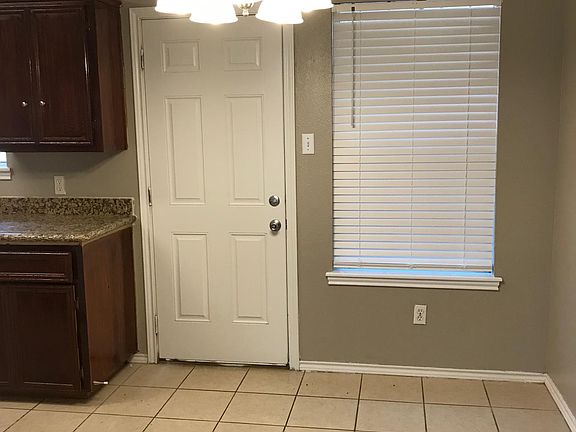 Back door from kitchen to backyard.