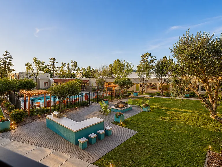 Relaxing courtyard with pool and fire pit
