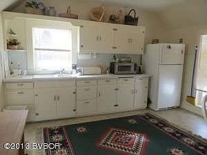 Lots of cabinets-upstairs kitchen