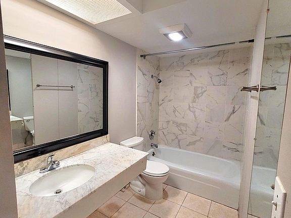 Bathroom with shower and tub