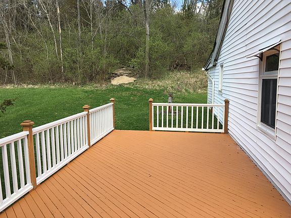 Wraparound porch connects to front porch
