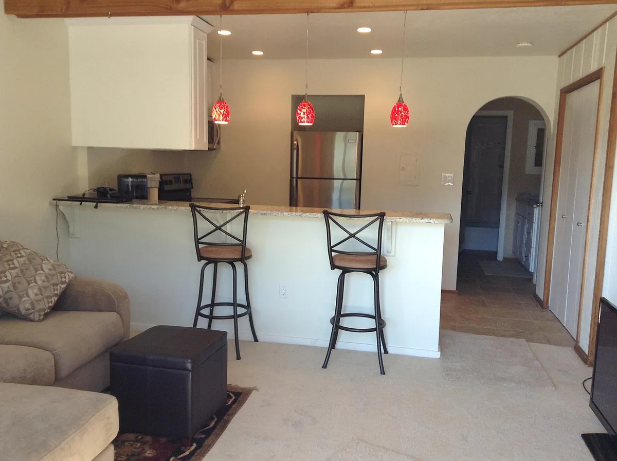 View from front sliding doors. Living room and kitchen. - 350 E La Bonte St