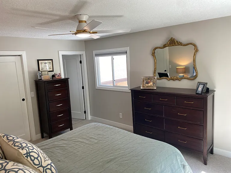 Primary bedroom, opening to bathroom