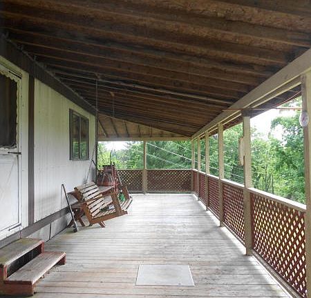 Covered front porch for admiring the view!